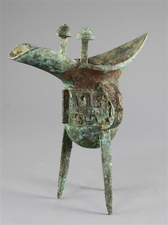 A Chinese bronze Jue vessel, in Shang dynasty style, height 23cm